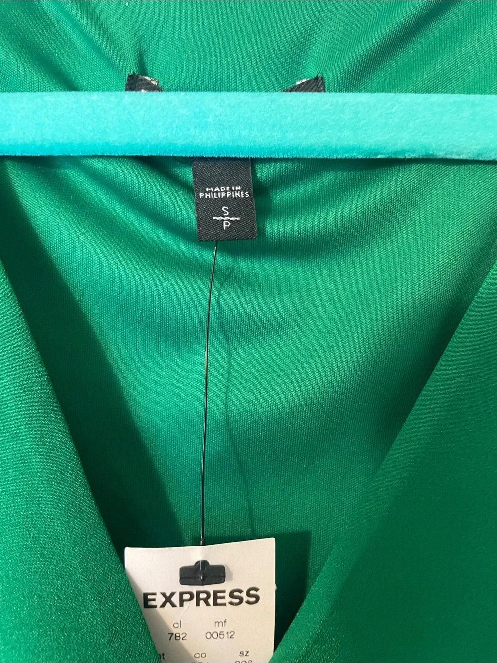 Express Green V-Neck Top with Cream Fitted Mini Skirt